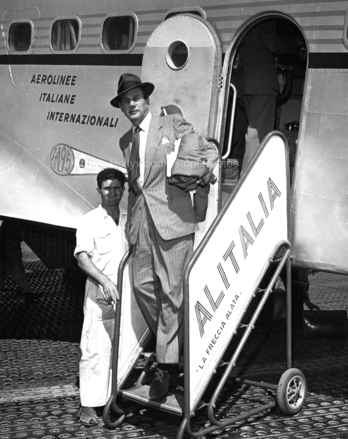 Joseph Cotton 1950 Arriving in Italy Alitalia Airlines.jpg